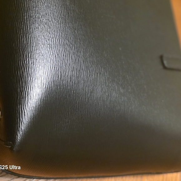 DKNY Bryant Medium Zippered Tote Bag in black leather with gold-tone hardware.  - Picture 12 of 17